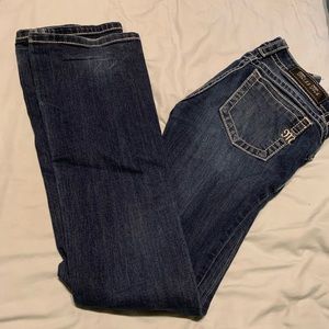 Miss me size 25 mid-rise boot cut jeans.